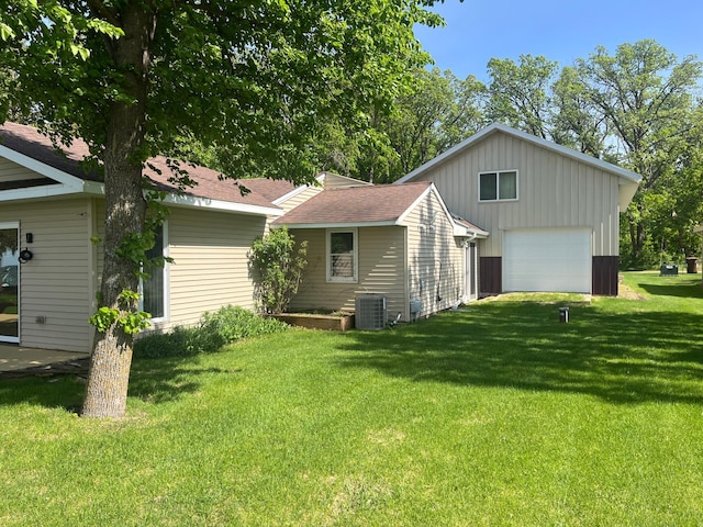 39307 Clearmont Rd, Everts Twp, MN 56515 - view of side of property featuring a lawn, cooling unit, and board and batten siding