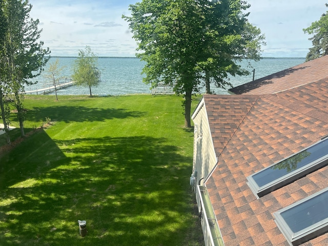 39307 Clearmont Rd, Everts Twp, MN 56515 - view of green lawn with a water view
