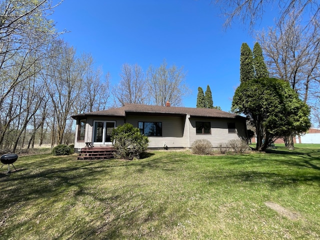 37165 300th Ave NE, Rollis Twp, MN 56724 - view of front of house featuring a front lawn and a chimney
