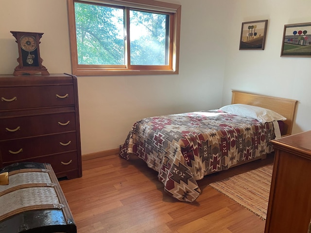 37165 300th Ave NE, Rollis Twp, MN 56724 - bedroom featuring light wood-style floors and baseboards