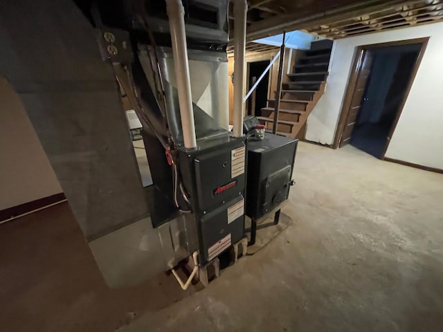 37165 300th Ave NE, Rollis Twp, MN 56724 - unfinished basement featuring stairway and baseboards