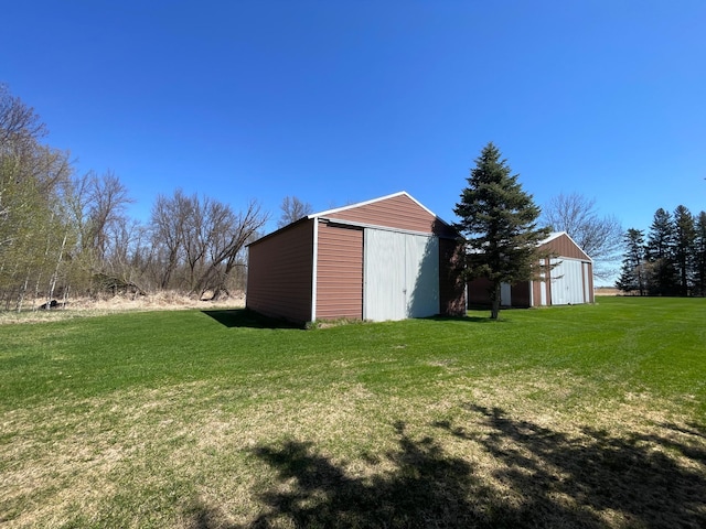 37165 300th Ave NE, Rollis Twp, MN 56724 - view of pole building featuring a lawn