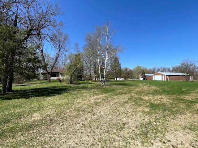 37165 300th Ave NE, Rollis Twp, MN 56724 - view of grassy yard with an outbuilding