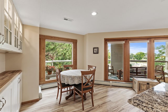 14575 Burma Ave W Unit 306, Rosemount, MN 55068 - dining space with plenty of natural light, baseboard heating, light wood-type flooring, and recessed lighting