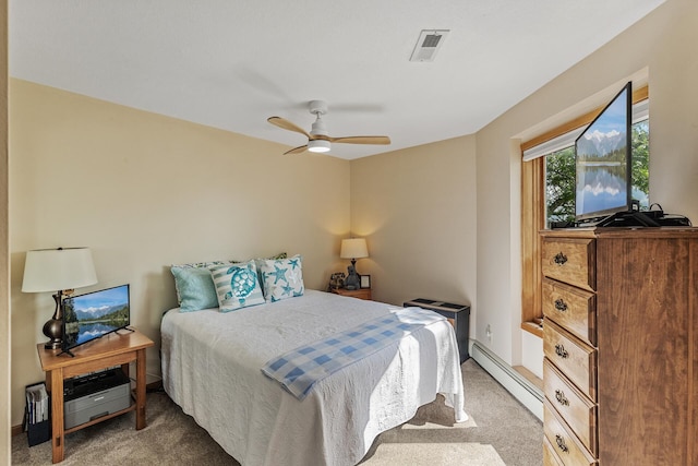 14575 Burma Ave W Unit 306, Rosemount, MN 55068 - bedroom with a baseboard heating unit, light carpet, and ceiling fan