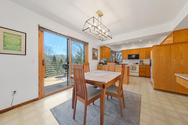 dining space featuring light floors, a chandelier, a textured ceiling, baseboards, and recessed lighting