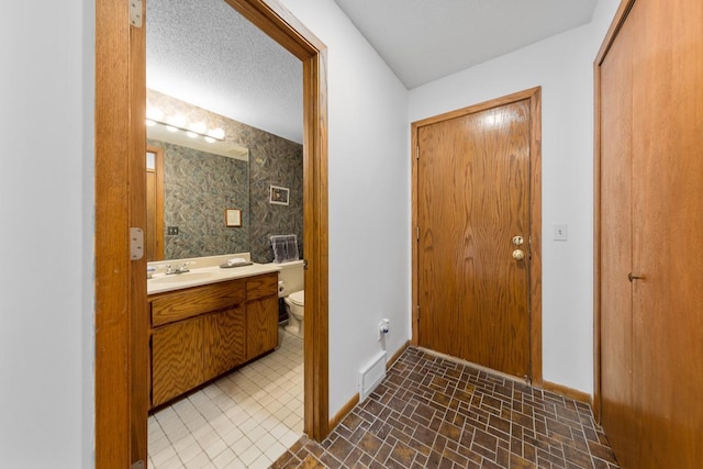 interior space featuring baseboards