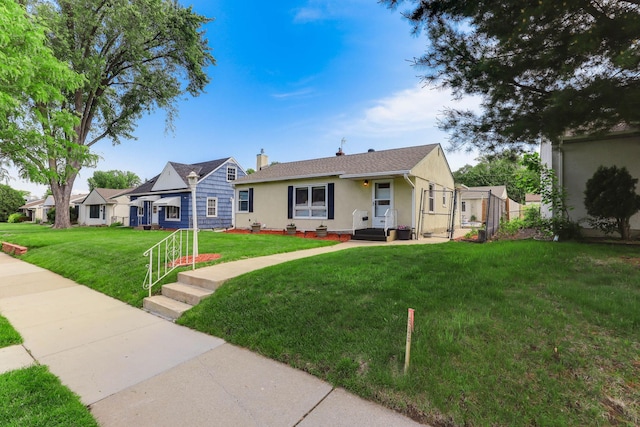 864 Howard St N, Saint Paul, MN 55119 - ranch-style home with a front lawn, stucco siding, and a chimney
