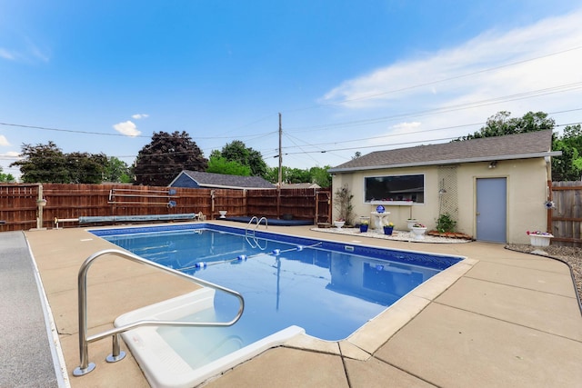 864 Howard St N, Saint Paul, MN 55119 - view of swimming pool with a fenced backyard, an outdoor structure, and a patio area
