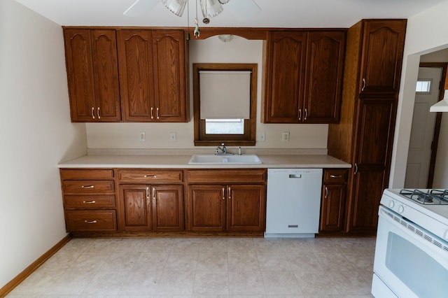 1651 5th St E, Saint Paul, MN 55106 - kitchen featuring white appliances, a sink, ceiling fan, and light countertops