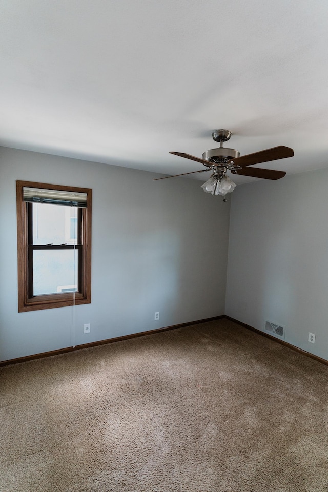 1651 5th St E, Saint Paul, MN 55106 - carpeted empty room with ceiling fan and baseboards
