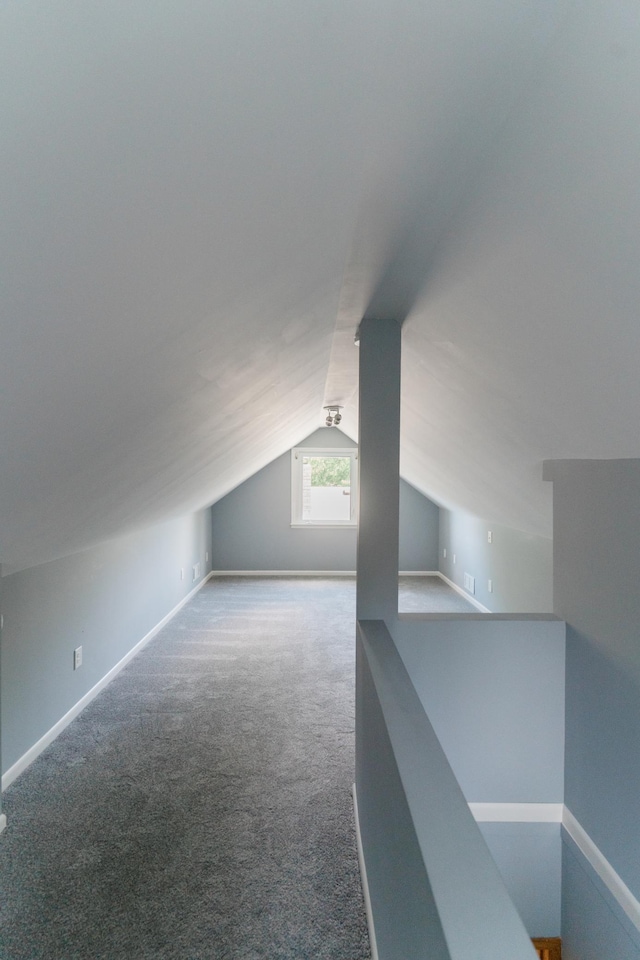 1651 5th St E, Saint Paul, MN 55106 - additional living space with carpet, vaulted ceiling, and baseboards