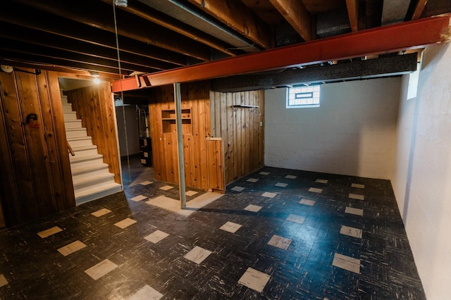 1651 5th St E, Saint Paul, MN 55106 - below grade area with tile patterned floors, stairs, and concrete block wall