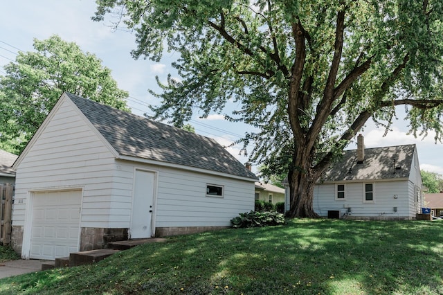 1651 5th St E, Saint Paul, MN 55106 - detached garage with central AC unit