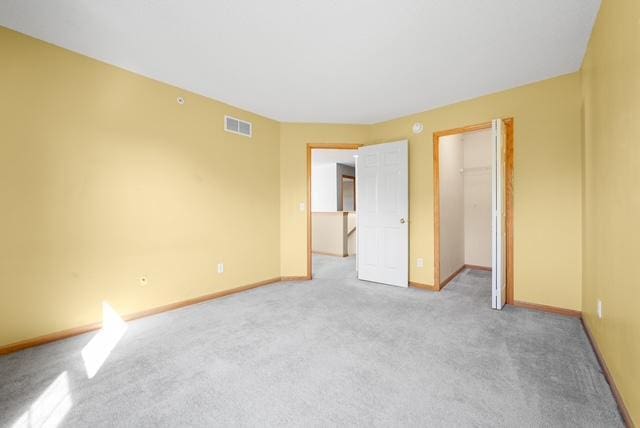 11353 Fergus St NE Unit A, Blaine, MN 55449 - unfurnished bedroom featuring light colored carpet and baseboards