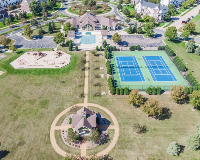 11353 Fergus St NE Unit A, Blaine, MN 55449 - aerial view of property and surrounding area featuring a pool area