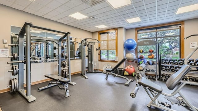 11353 Fergus St NE Unit A, Blaine, MN 55449 - workout area featuring a drop ceiling