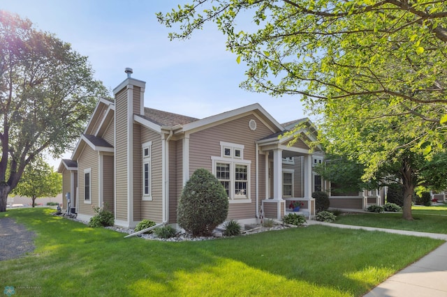 1395 Highpointe Dr N, Fargo, ND 58102 - view of front of property featuring a chimney and a front yard
