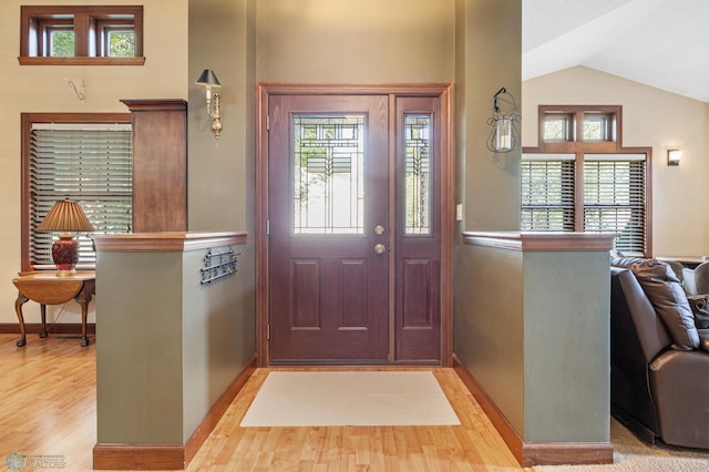 1395 Highpointe Dr N, Fargo, ND 58102 - entryway with wood finished floors, baseboards, and vaulted ceiling