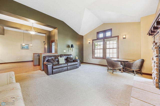 1395 Highpointe Dr N, Fargo, ND 58102 - living area with baseboards, carpet, and high vaulted ceiling