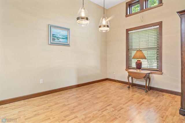 1395 Highpointe Dr N, Fargo, ND 58102 - spare room with light wood-type flooring and baseboards