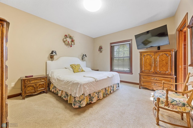 1395 Highpointe Dr N, Fargo, ND 58102 - bedroom featuring light colored carpet and baseboards