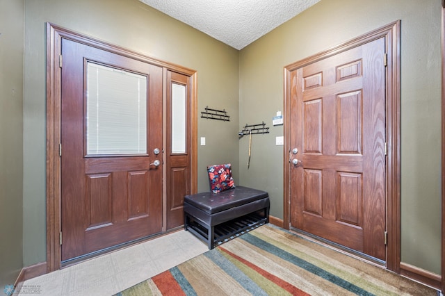 1395 Highpointe Dr N, Fargo, ND 58102 - foyer with a textured ceiling and baseboards