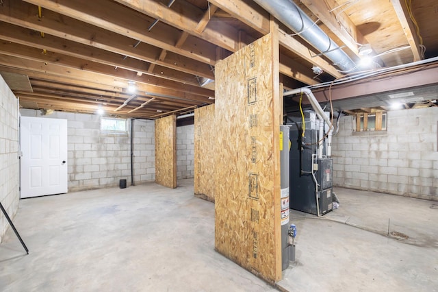 8464 Greenwood Dr, Mounds View, MN 55112 - below grade area featuring heating unit and water heater