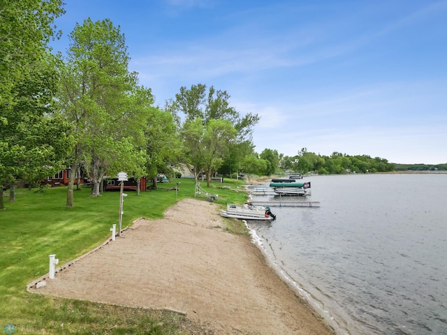 24527 Twilight Ln, Lida Twp, MN 56572 - dock area featuring a water view and a lawn