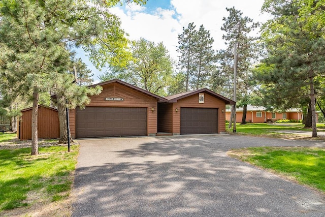 6769 County Road 13, Lake Edward Twp, MN 56468 - view of front of property with a garage and driveway