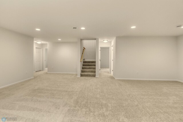 1474 66th Ave S, Fargo, ND 58104 - finished basement featuring recessed lighting, light carpet, stairs, and baseboards