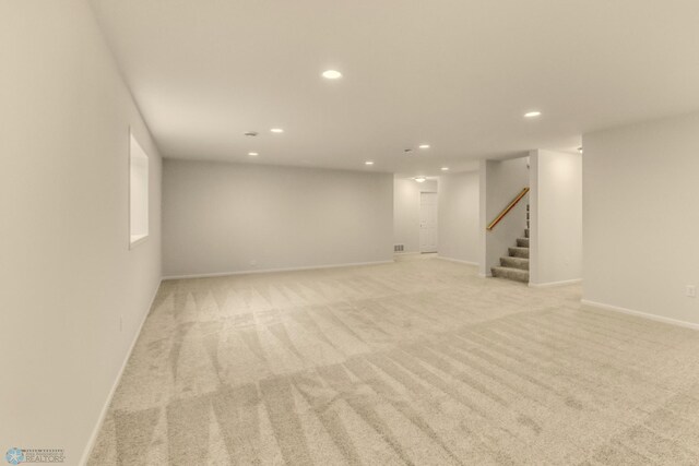 1474 66th Ave S, Fargo, ND 58104 - finished basement featuring recessed lighting, light carpet, stairs, and baseboards