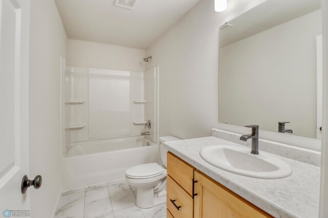 1474 66th Ave S, Fargo, ND 58104 - bathroom featuring vanity, marble look tile flooring, toilet, and shower / bathtub combination