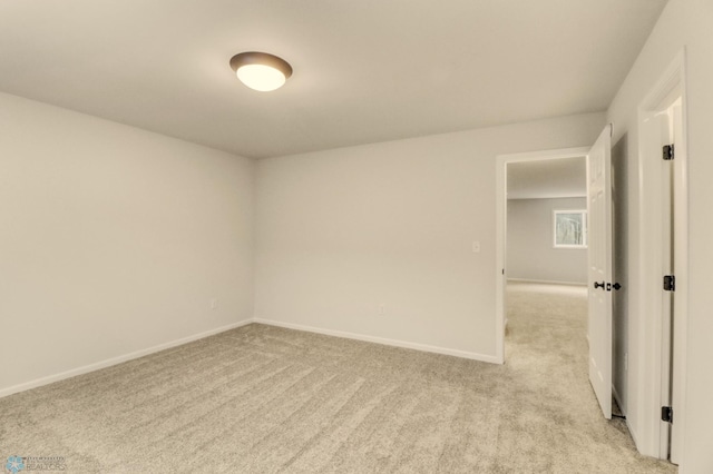 1474 66th Ave S, Fargo, ND 58104 - empty room with light carpet and baseboards