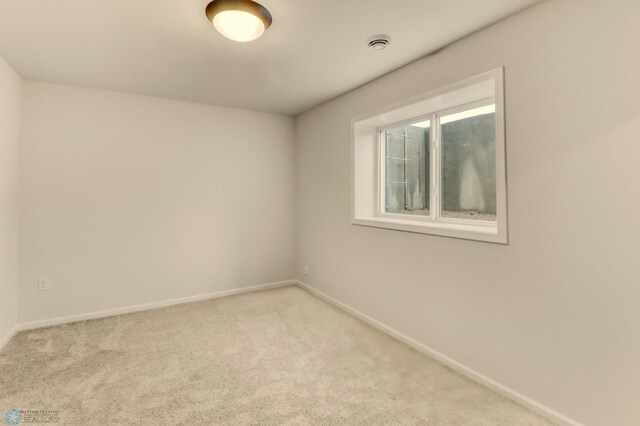 1474 66th Ave S, Fargo, ND 58104 - unfurnished room featuring carpet and baseboards