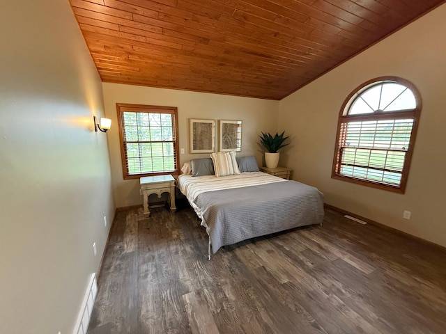 50429 245th Ave, Staples Twp, MN 56479 - bedroom featuring lofted ceiling, wood ceiling, dark wood-style floors, and baseboards