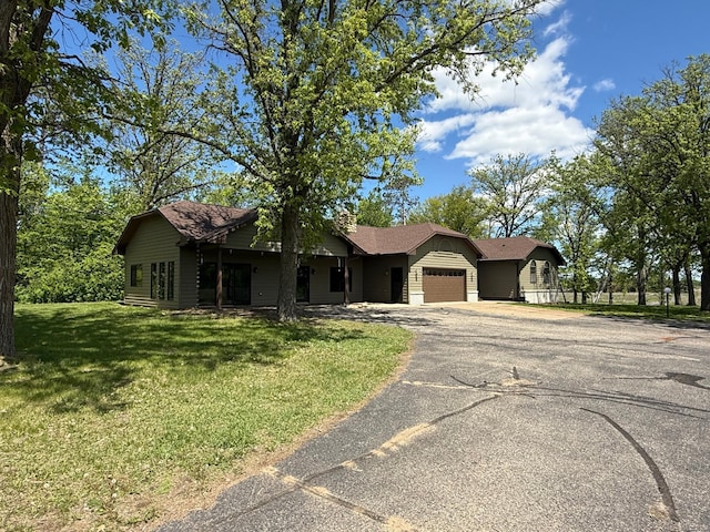 50429 245th Ave, Staples Twp, MN 56479 - ranch-style home featuring a garage, driveway, and a front lawn
