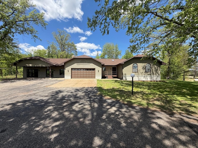 50429 245th Ave, Staples Twp, MN 56479 - ranch-style home featuring an attached garage, asphalt driveway, and a front yard