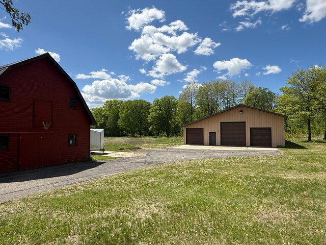 50429 245th Ave, Staples Twp, MN 56479 - view of barn featuring a lawn