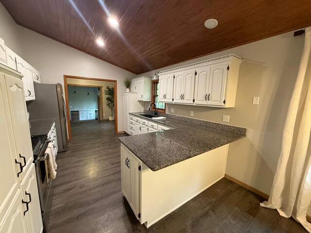 50429 245th Ave, Staples Twp, MN 56479 - kitchen featuring wood ceiling, stainless steel range oven, baseboards, white cabinetry, and a sink