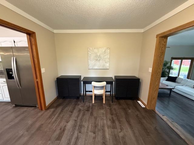 50429 245th Ave, Staples Twp, MN 56479 - home office featuring dark wood-style floors, a textured ceiling, and baseboards