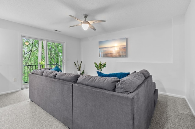 216 Crestview Cir, Jordan, MN 55352 - living area featuring ceiling fan, baseboards, and a textured ceiling