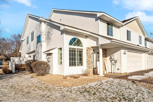 12828 43rd St NE, Saint Michael, MN 55376 - view of front of house featuring a garage and driveway