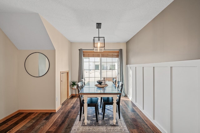 12828 43rd St NE, Saint Michael, MN 55376 - dining space with dark wood-style flooring, a textured ceiling, and baseboards