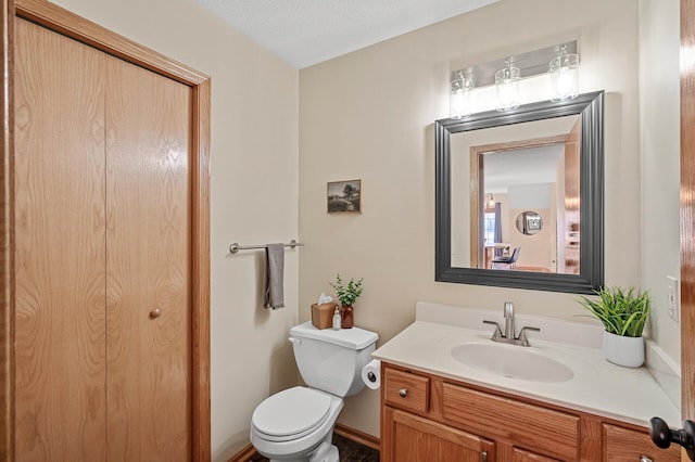12828 43rd St NE, Saint Michael, MN 55376 - half bathroom featuring vanity and toilet