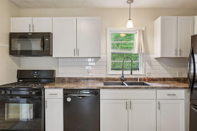 2005 Nokomis Ave, Saint Paul, MN 55119 - kitchen with black appliances, a sink, dark countertops, white cabinetry, and a textured ceiling