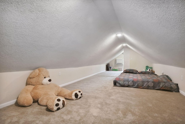 2005 Nokomis Ave, Saint Paul, MN 55119 - bedroom with a textured ceiling, baseboards, lofted ceiling, and carpet flooring