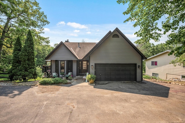 15657 Fish Point Rd SE, Prior Lake, MN 55372 - ranch-style home featuring driveway, a chimney, and an attached garage