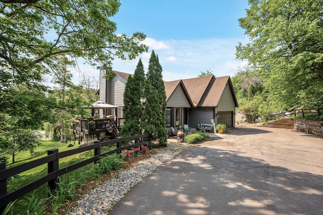 15657 Fish Point Rd SE, Prior Lake, MN 55372 - view of front of home with asphalt driveway and an attached garage
