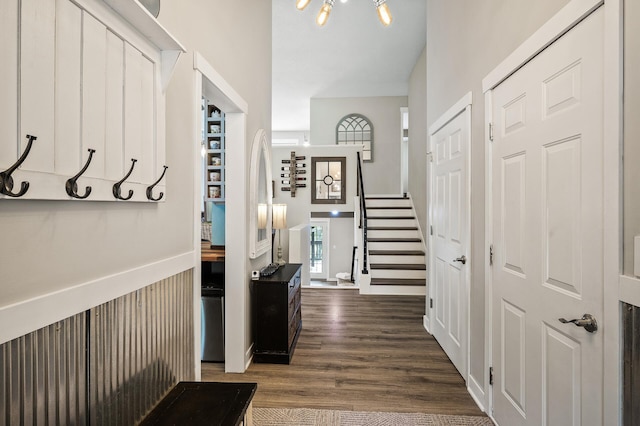15657 Fish Point Rd SE, Prior Lake, MN 55372 - hall featuring stairway and dark wood-type flooring